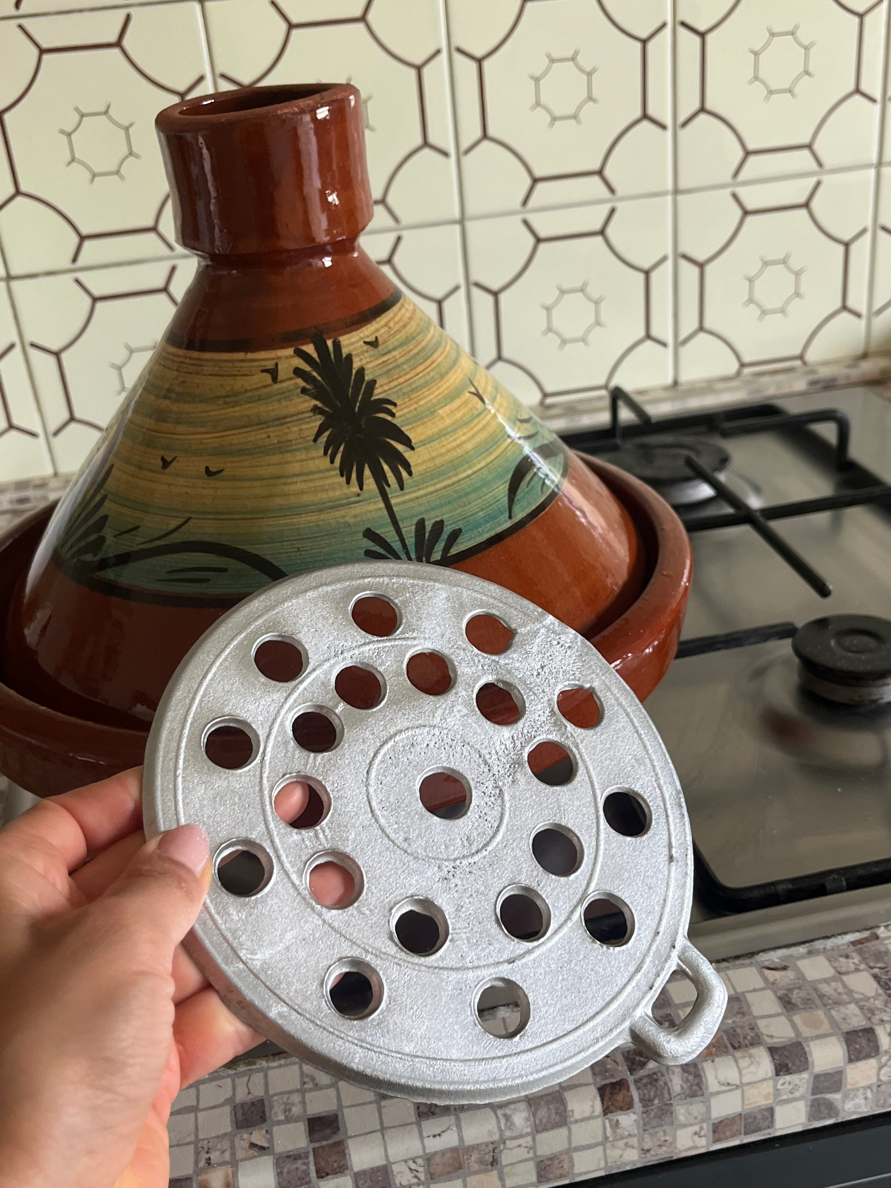 Spargifiamma per tajine in terracotta